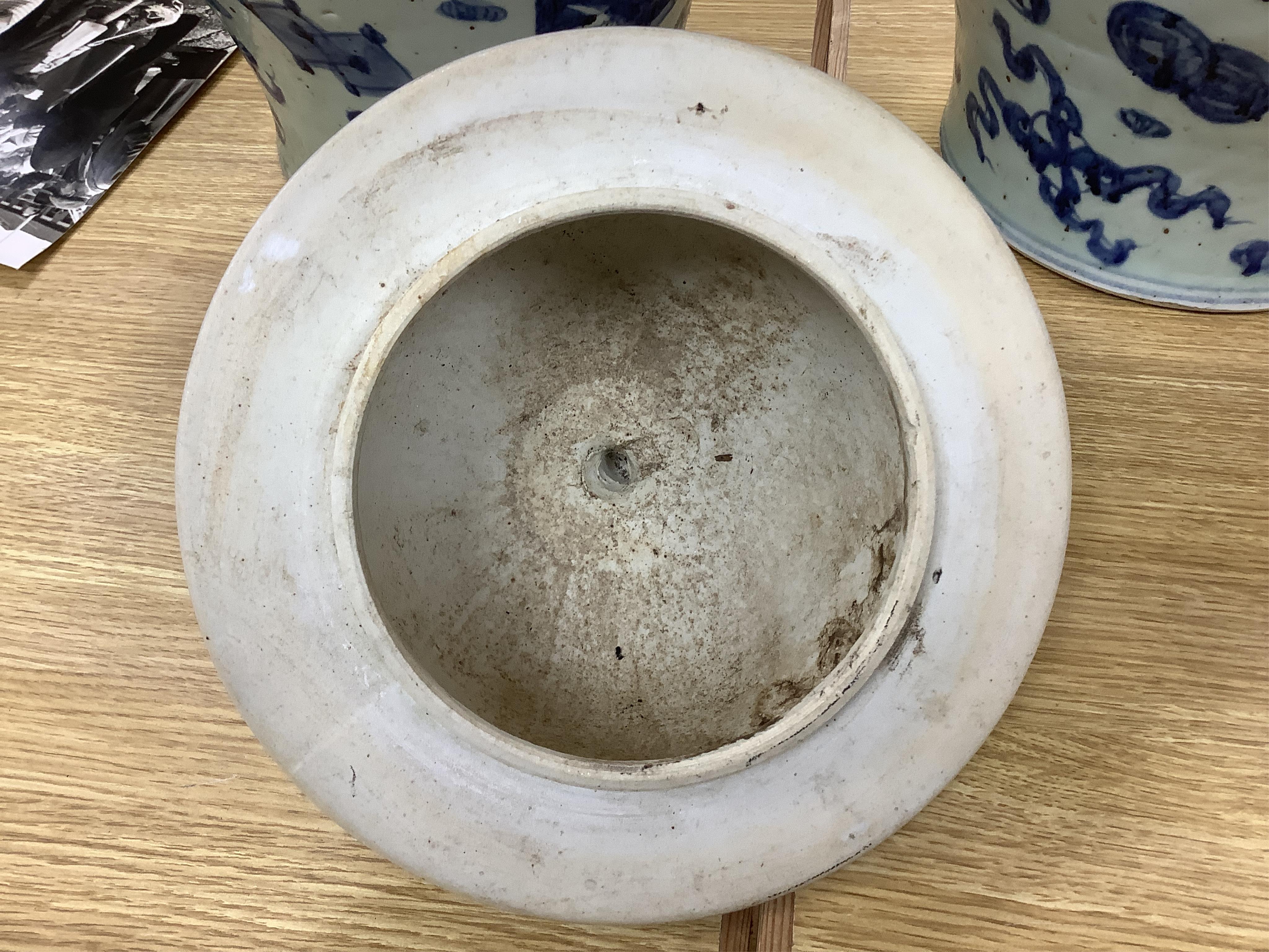 A large pair of Chinese blue and white ginger jars and covers, 54cm high. Condition - fair to good